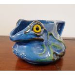 C H Brannam Pottery Grotesque Frog circa 1900 with yellow glass eyes and makers marks to base.