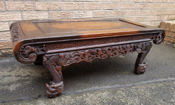Carved Chinese Wooden Hardwood Table decorated with dragons and bats and scroll ends