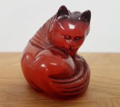 Netsuke of a Cat Cleaning Itself, height 40mm and weight is 32g