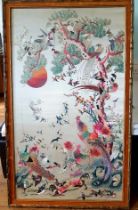 A Large Framed Chinese Embroidered Silk Panel decorated with birds