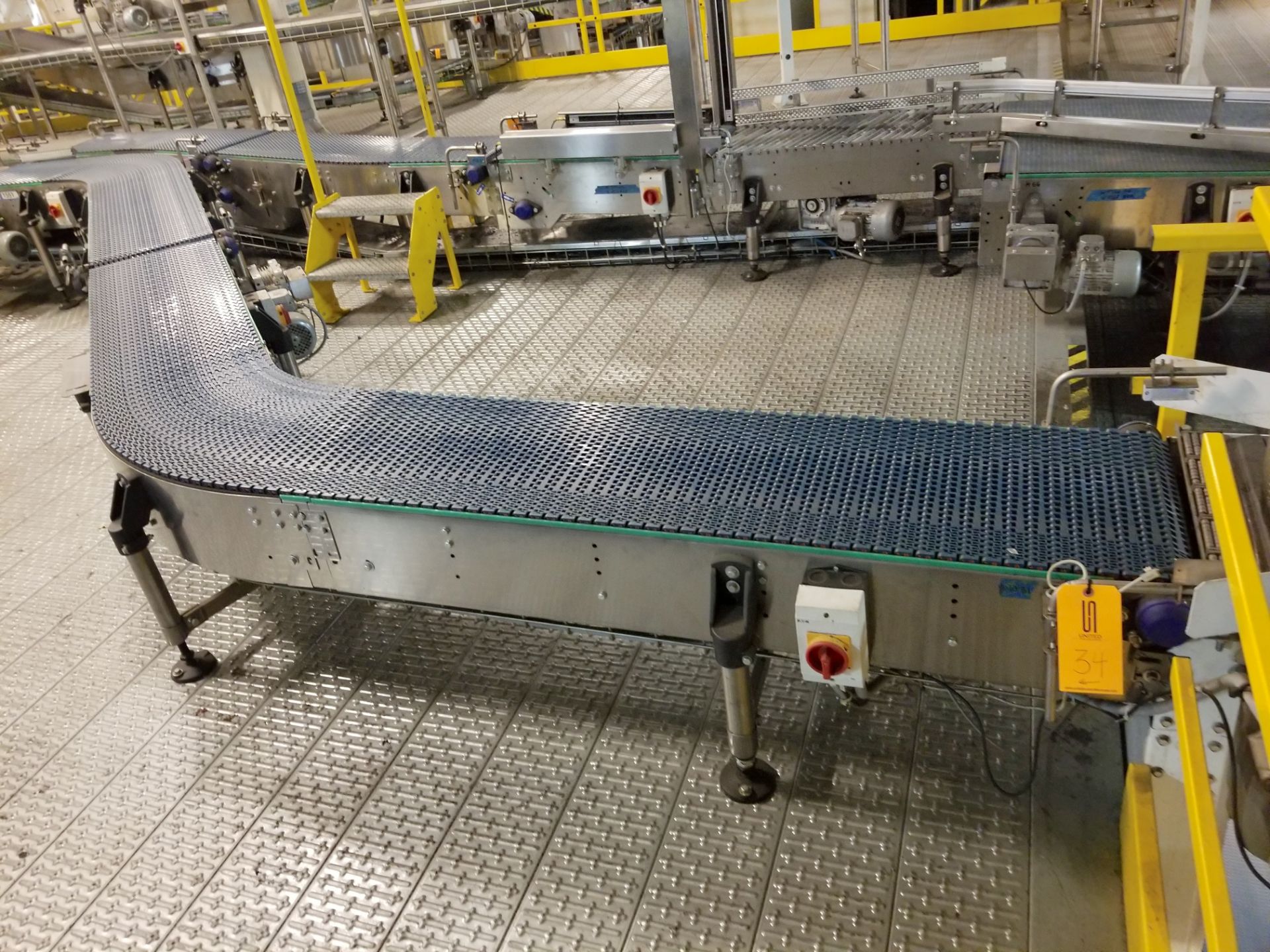 Europool Case Conveyor from Manual Pick B System - Discharge of Spiral to Case Switch