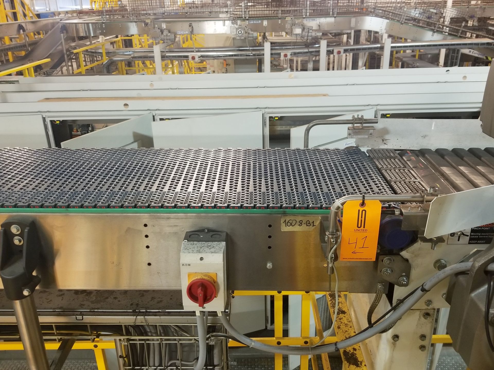 Europool Case Conveyor from Manual Pick B System - Discharge of Spiral to Case Switch