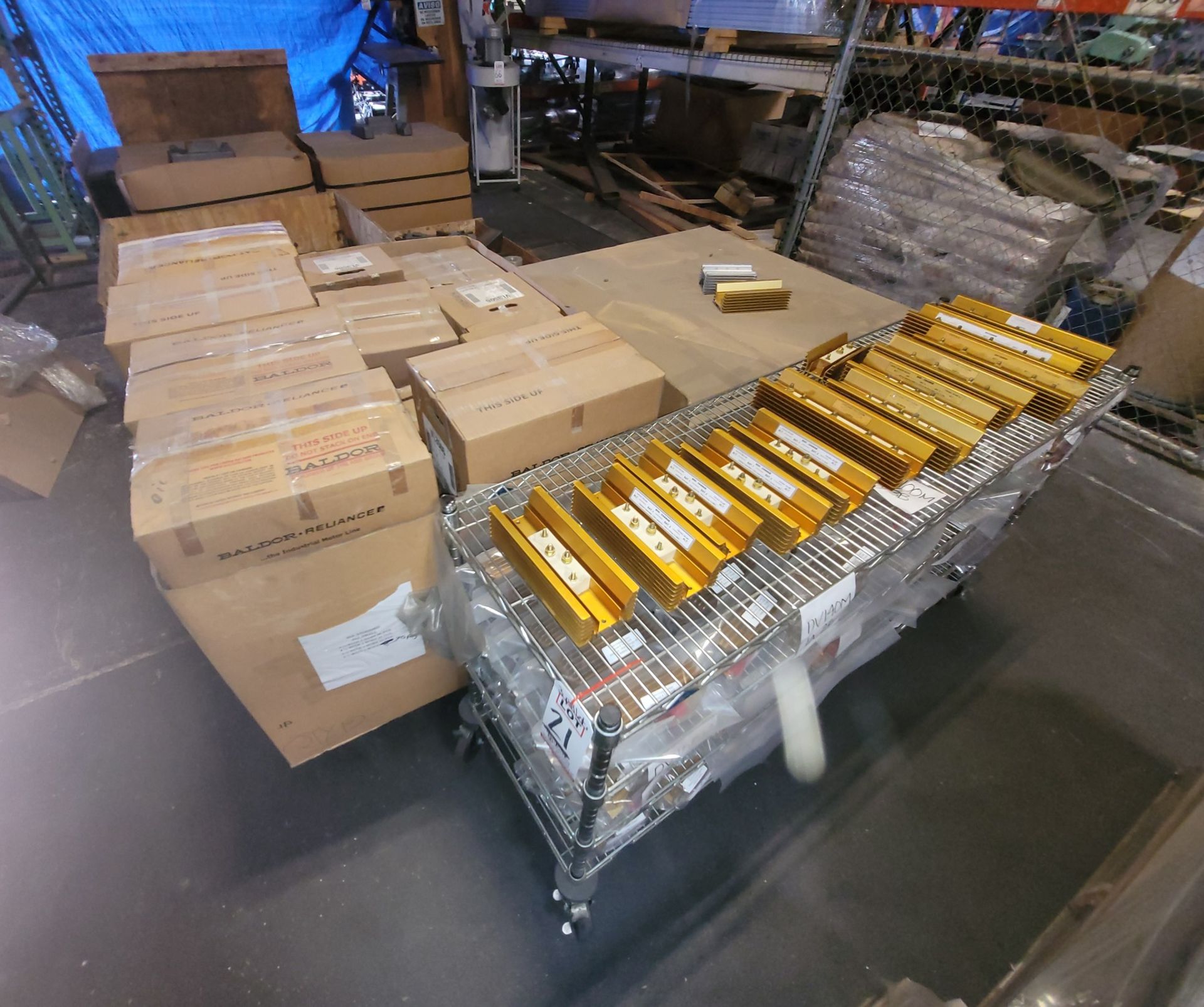 LOT - (2) PALLETS OF ALUMINUM SCRAP, PLUS CART OF DIVI-CHARGE MARINE BATTERY ISOLATORS, INCLUDES