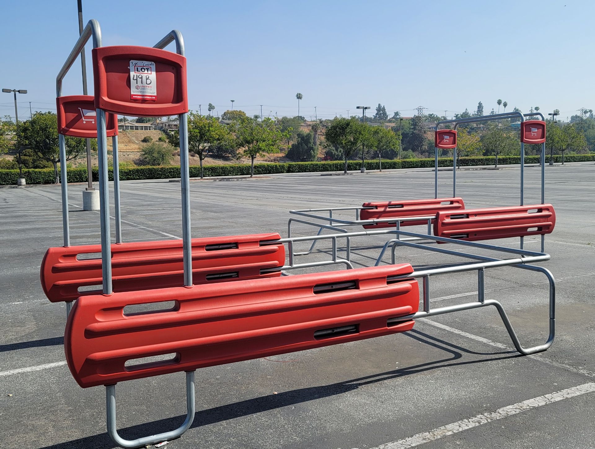 LOT - (3) OUTDOOR SHOPPING CART CORRALS