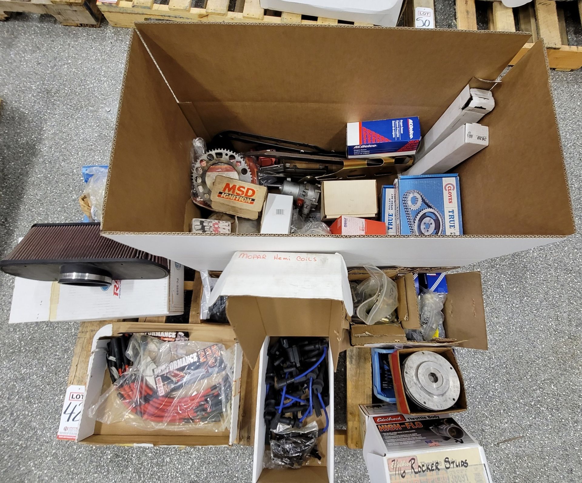 LOT - PALLET OF MISC PARTS: IGNITION WIRES, TIMING CHAIN SETS, ETC.