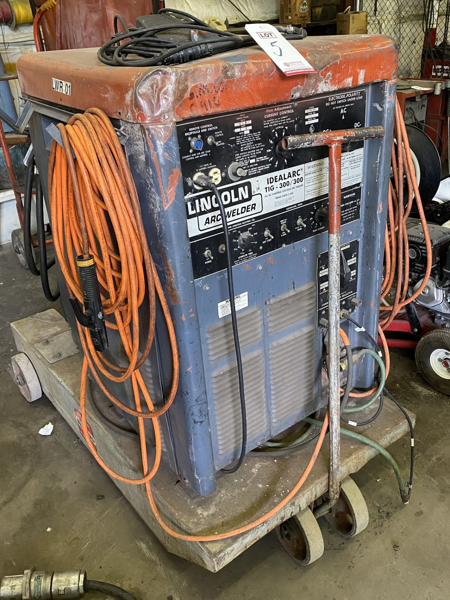 LINCOLN IDEALARC TIG 300/300, S/N AC557963, W/ MILLER COOLMATE 3 AND FOOT CONTROLLER (LOCATION: AS)