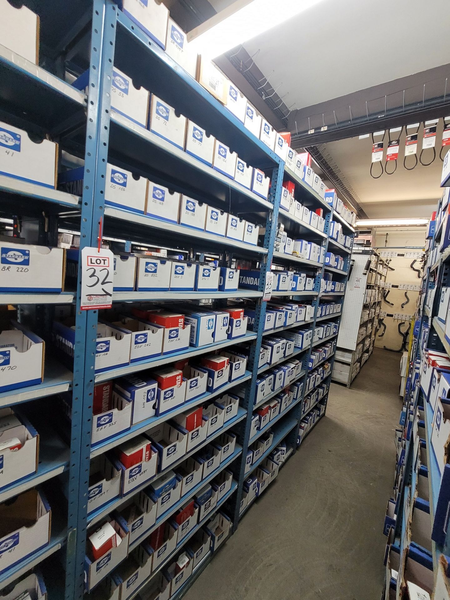 LOT - CONTENTS ONLY OF (1) 3' WIDE SECTION OF STOCK RACK, TO INCLUDE DISTRIBUTOR CAPS & ROTORS,