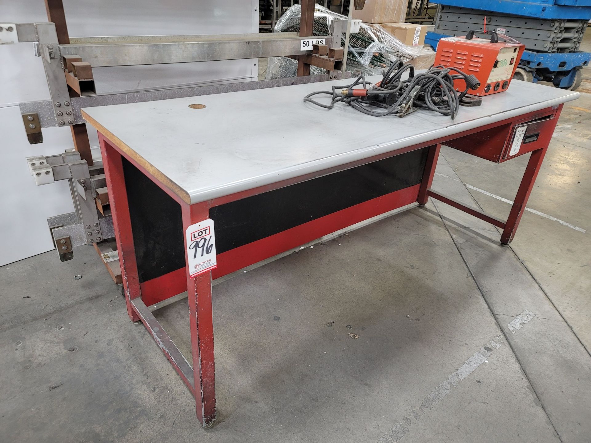 STEEL TABLE W/ 30" X 7' PARTICLE BOARD TOP, 36" TOP HEIGHT