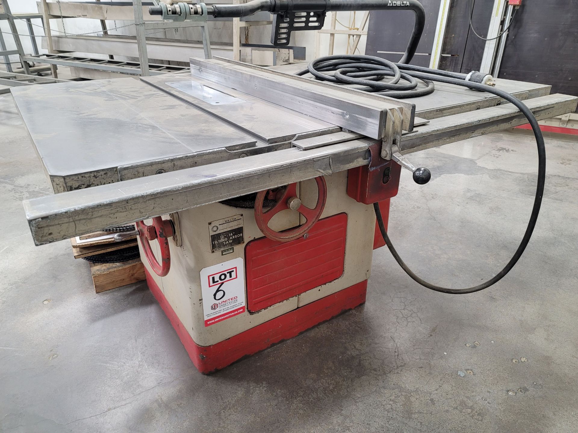 DELTA 12"-14" TABLE SAW, TILTING ARBOR, COMES W/ COLLECTION OF BLADES, 1" ARBOR