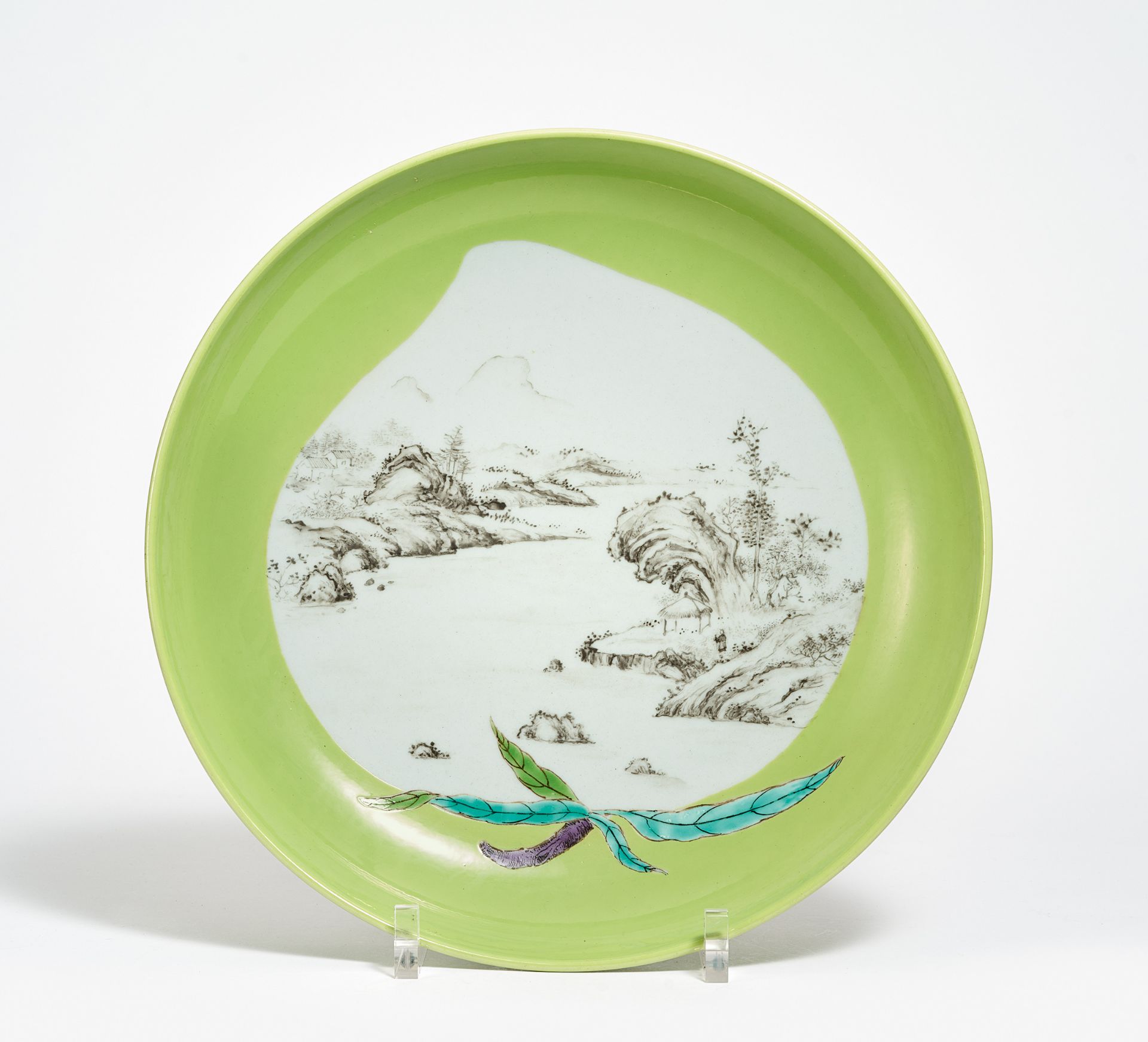 LARGE LANDSCAPE DISH. China. Qing dynasty. 19th c. Heavy porcelain with monochrome apple green