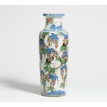 VASE WITH GRAPES AND SQUIRRELS. China. Porcelain, painted in underglaze blue and wucai enamel.