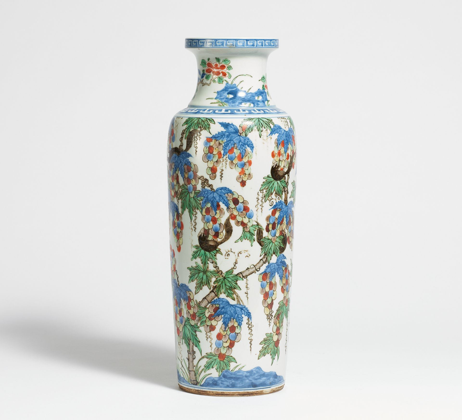 VASE WITH GRAPES AND SQUIRRELS. China. Porcelain, painted in underglaze blue and wucai enamel.