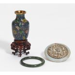 SMALL MIRROR, JADE ARM SPANGLE AND CLOISONNÉ VASE. China. 19th-20th c. a) Mirror with silver back