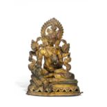 WHITE TARA ON LOTUS BASE. Nepal. 19th c. Bronze with remains of gilding and pigments. Figure cast,