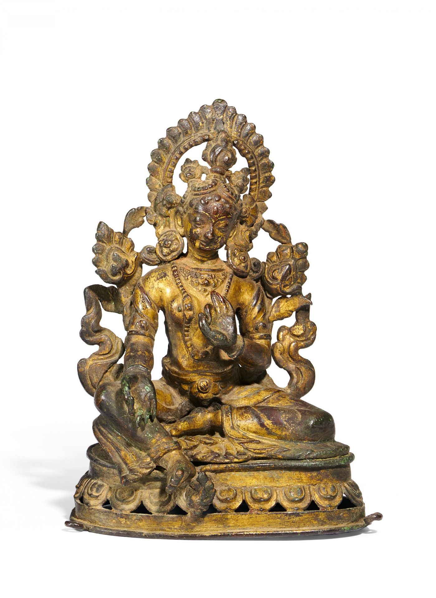 WHITE TARA ON LOTUS BASE. Nepal. 19th c. Bronze with remains of gilding and pigments. Figure cast,