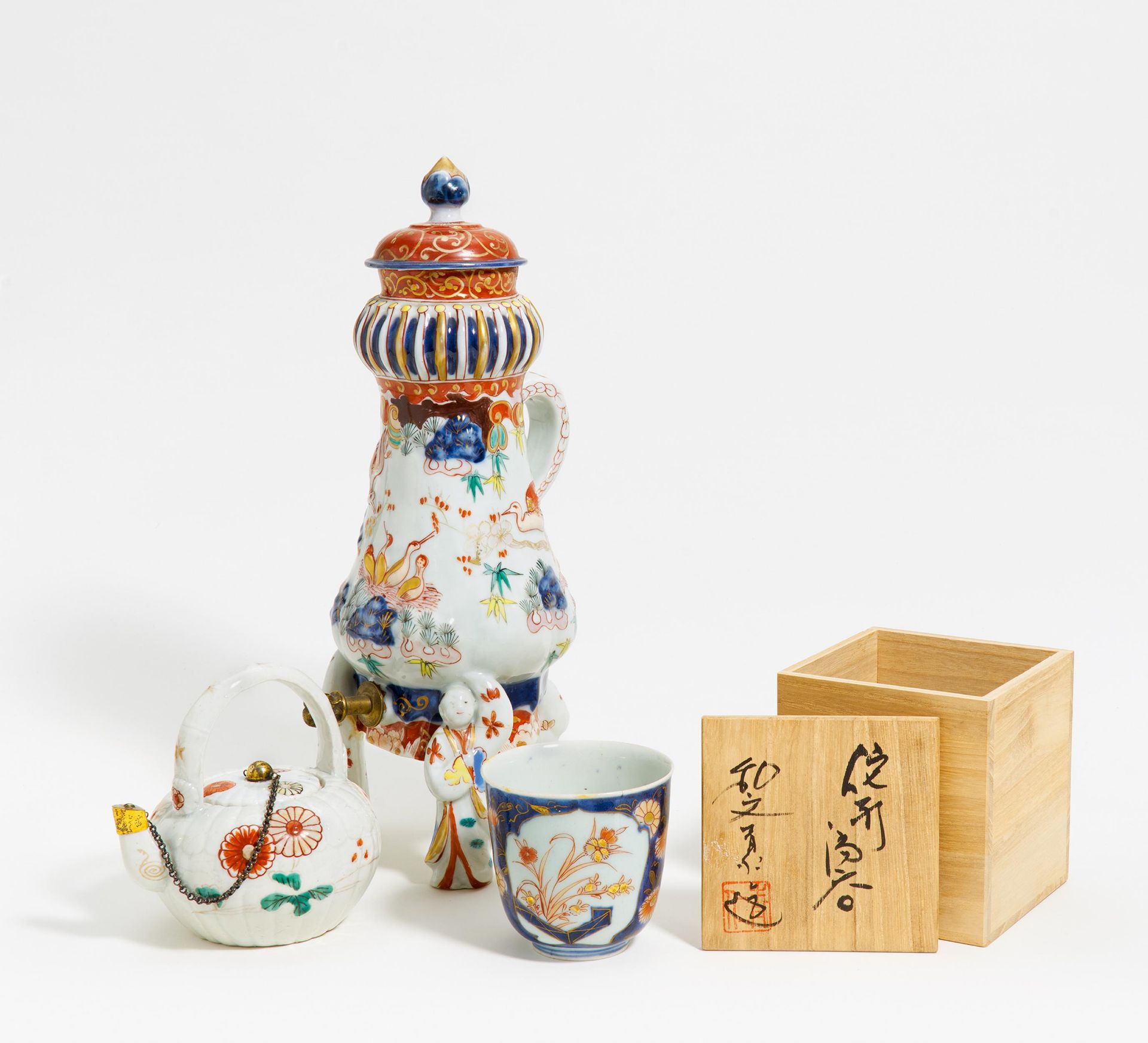 RARE COFFEE POT, TEA POT AND CUP. Japan. Edo period. Arita porcelain, partly with relief, painted in