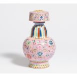 BHUMPA VASE WITH ASHTAMANGALA IN LOTUS SCROLLS. China. Porcelain painted in famille rose on pink