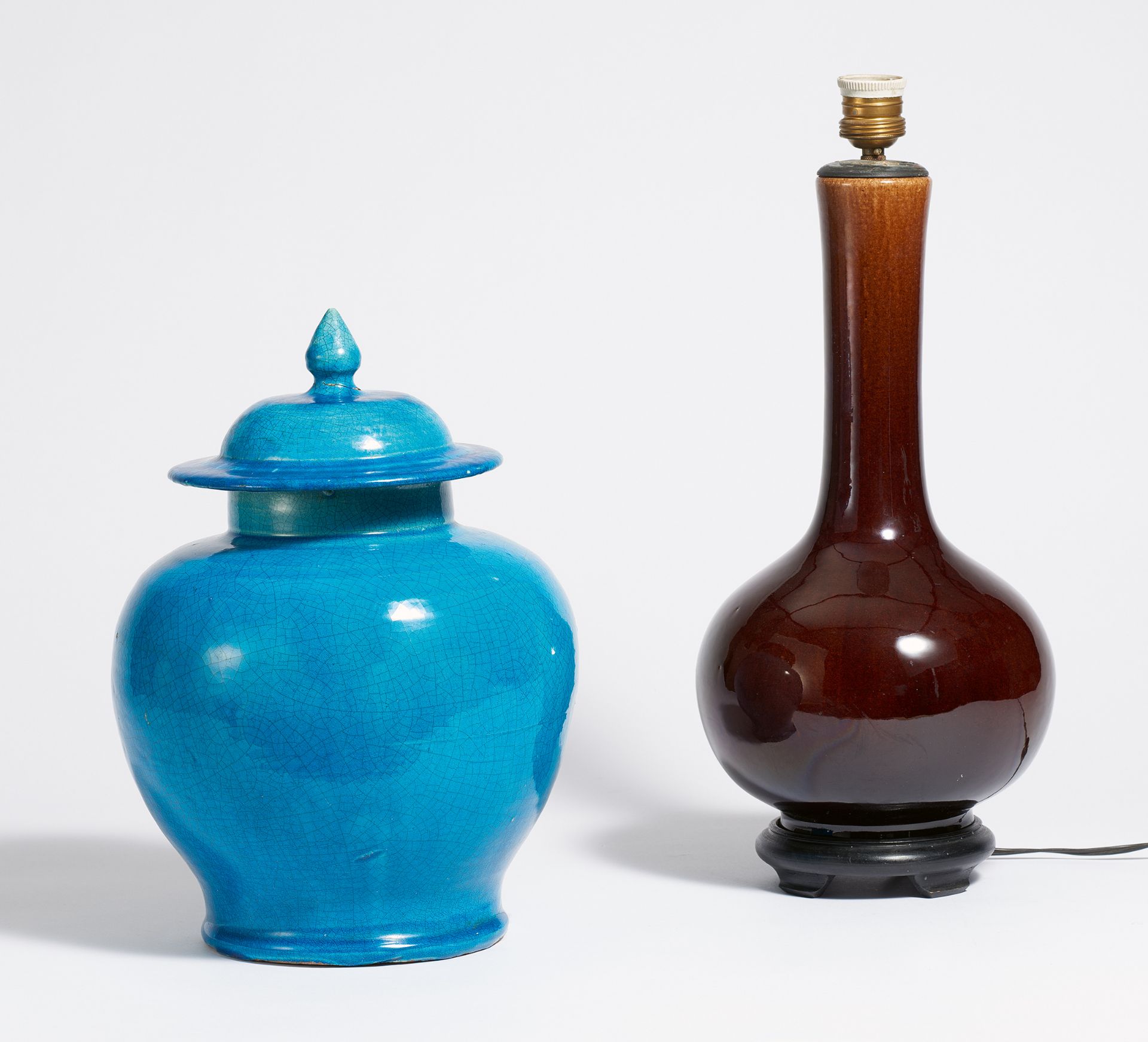 LIDDED VASE AND LONG-NECKED VASE. China. a) Lidded vase. Stoneware with peacock blue glaze in