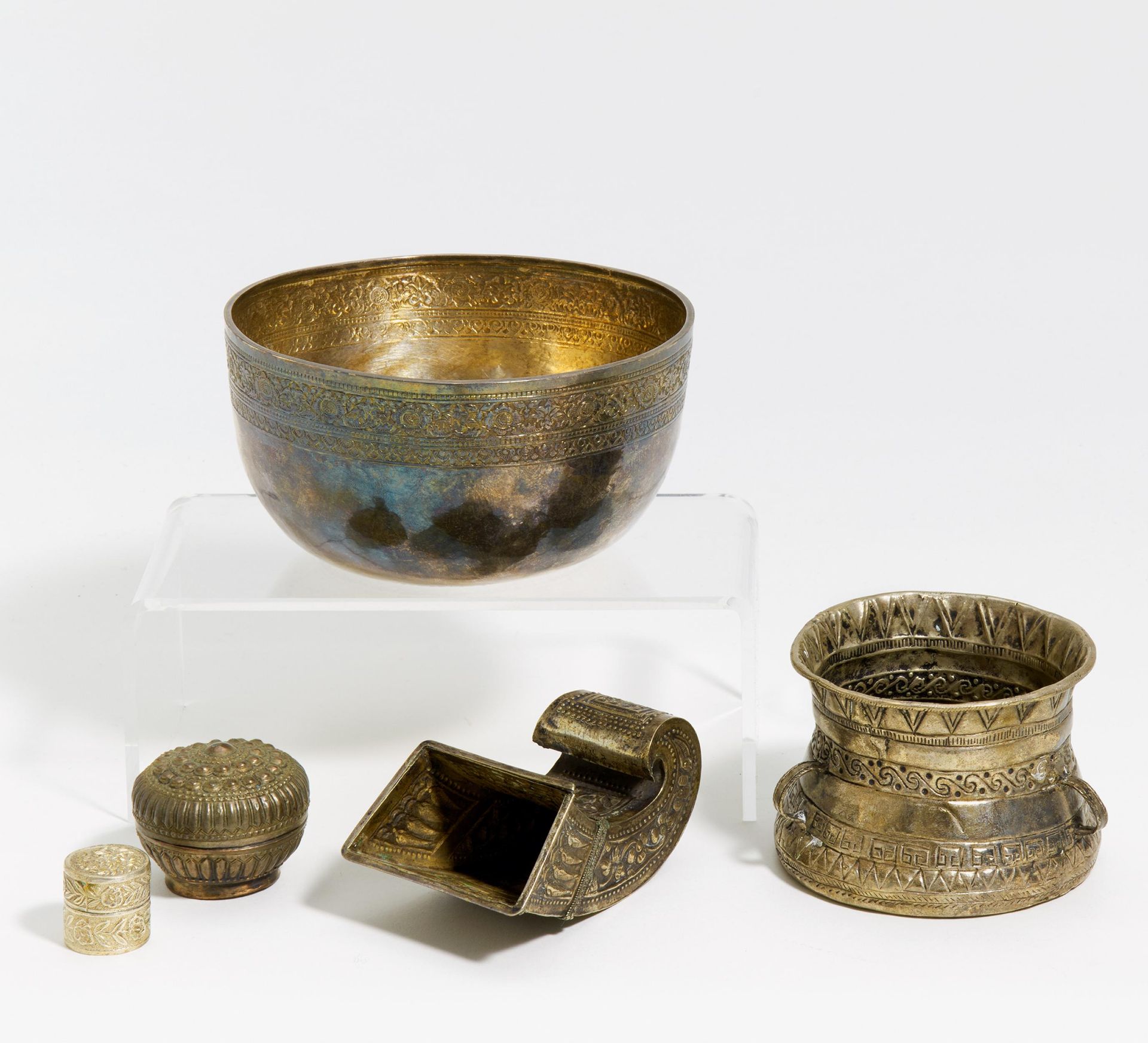 FIVE VESSELS. Thailand/Asia. 19th/20th c. Silver in repoussé work. Bowl. Denoted in Thai. H.7.6cm, Ø