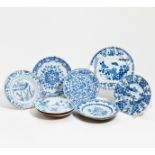 TEN DISHES WITH BLOWERS AND LANDSCAPE. China. Qing dynasty. 18th c. Porcelain in underglaze blue and