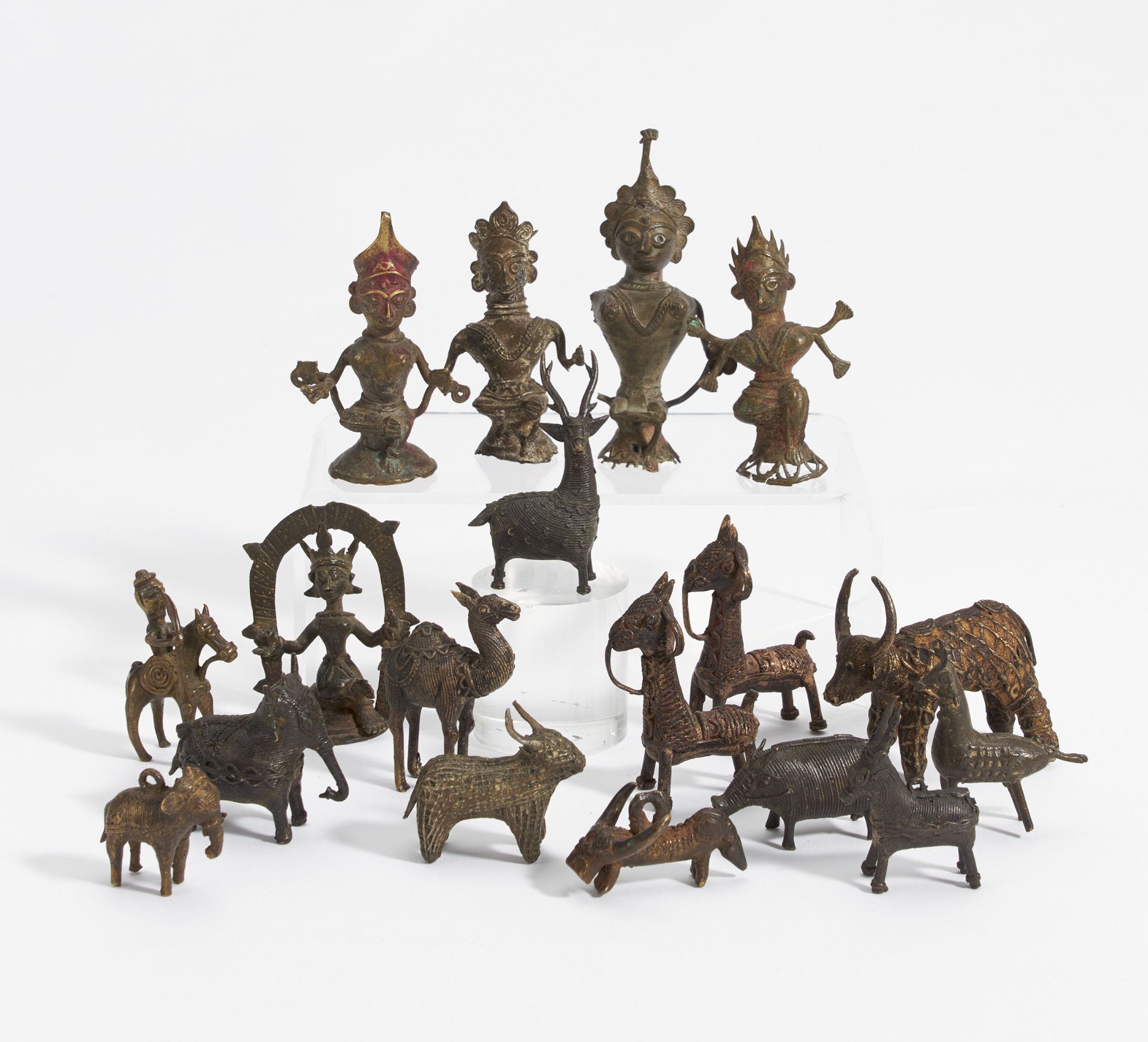 18 SMALL FIGURES OF GODS AND ANIMALS. East India. Regions Odisha and Bastar. 19th-20th c. Bronze