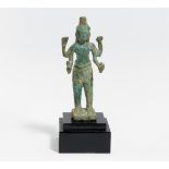 SMALL FIGURE OF THE FOURARMED VISHNU. Khmer. Angkor period. Ca. 12th/13th c. Bronze with green