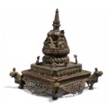 RARE STUPA WITH THE FOUR TATHAGATA BUDDHA. Nepal. 18th/19th c. Copper bronze with residue of gilding