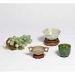 WEDDING BOWL WITH DRAGON HANDLES AND TWO DRINKING BOWLS. 19th-20th c. Jade, grey with dark veins,