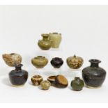 TWELVE VASES, KENDI AND COVERED BOXES. Thailand. Sukhothai period (1238-1438) or Ayutthaya period (