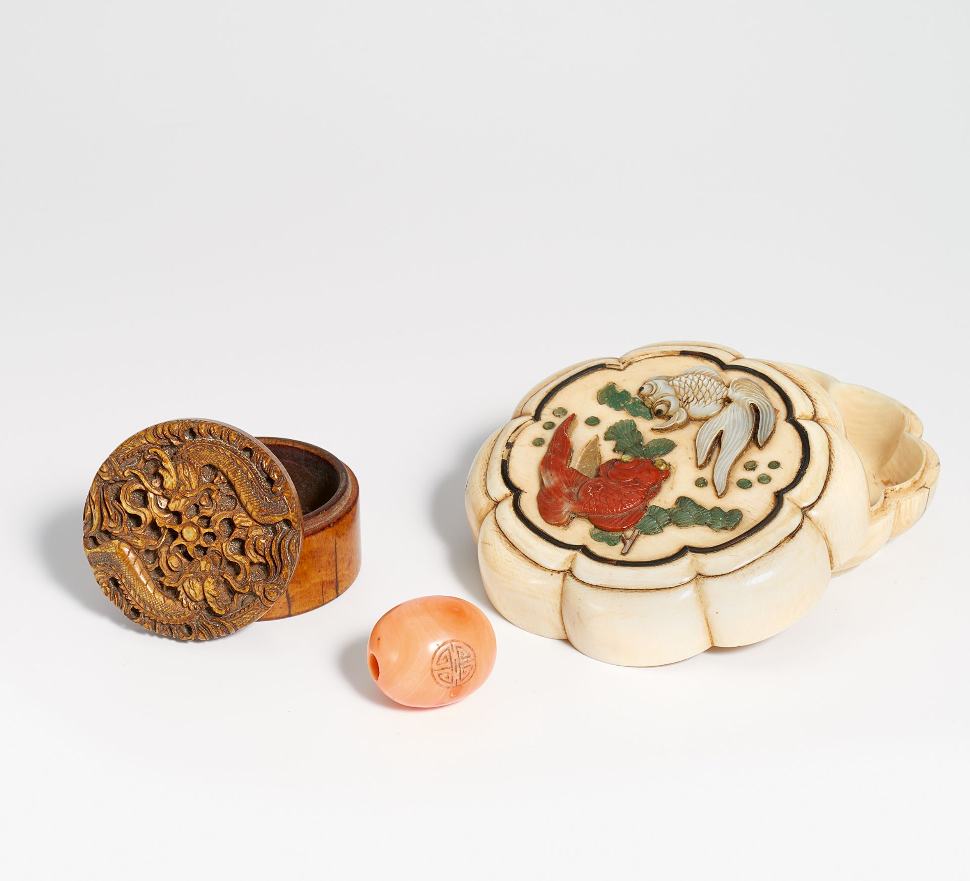 TWO IVORY LIDDED BOXED. China. 19th c. or earlier. a) Flower shaped lidded box with gold fish. - Image 2 of 2