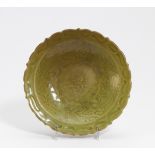 FLOWER-SHAPED CELADON DISH. China. Longquan. Ming Dynasty (1368-1644). Heavy porcelain, covered with