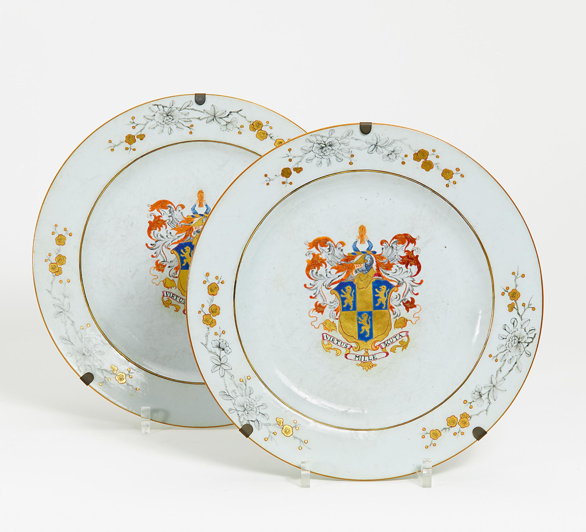 TWO LARGE PLATES WITH LION BLAZONS. China. Qing dynasty. 18th-19th c. Compagnie des Indes.