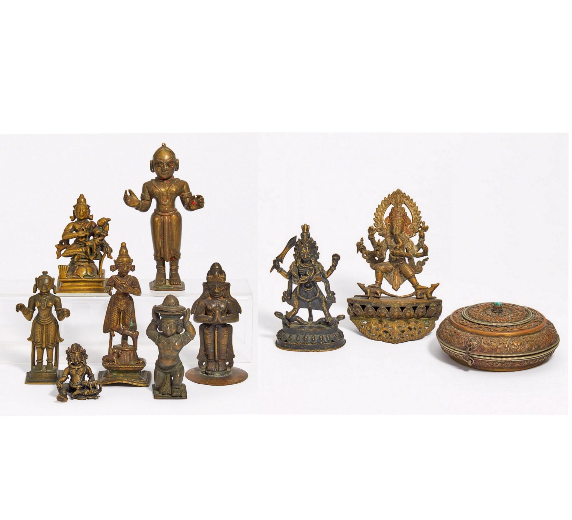 NINE DEITY FIGURES, ONE SACIFICIAL BOX AND A THANGKA OF RAHULA. India/Nepal. 17th-20th c. Bronze/