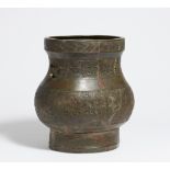 LARGE JAR IN THE SHAPE OF A FANG HU. China. Bronze with relief decoration, dark, stained patina.