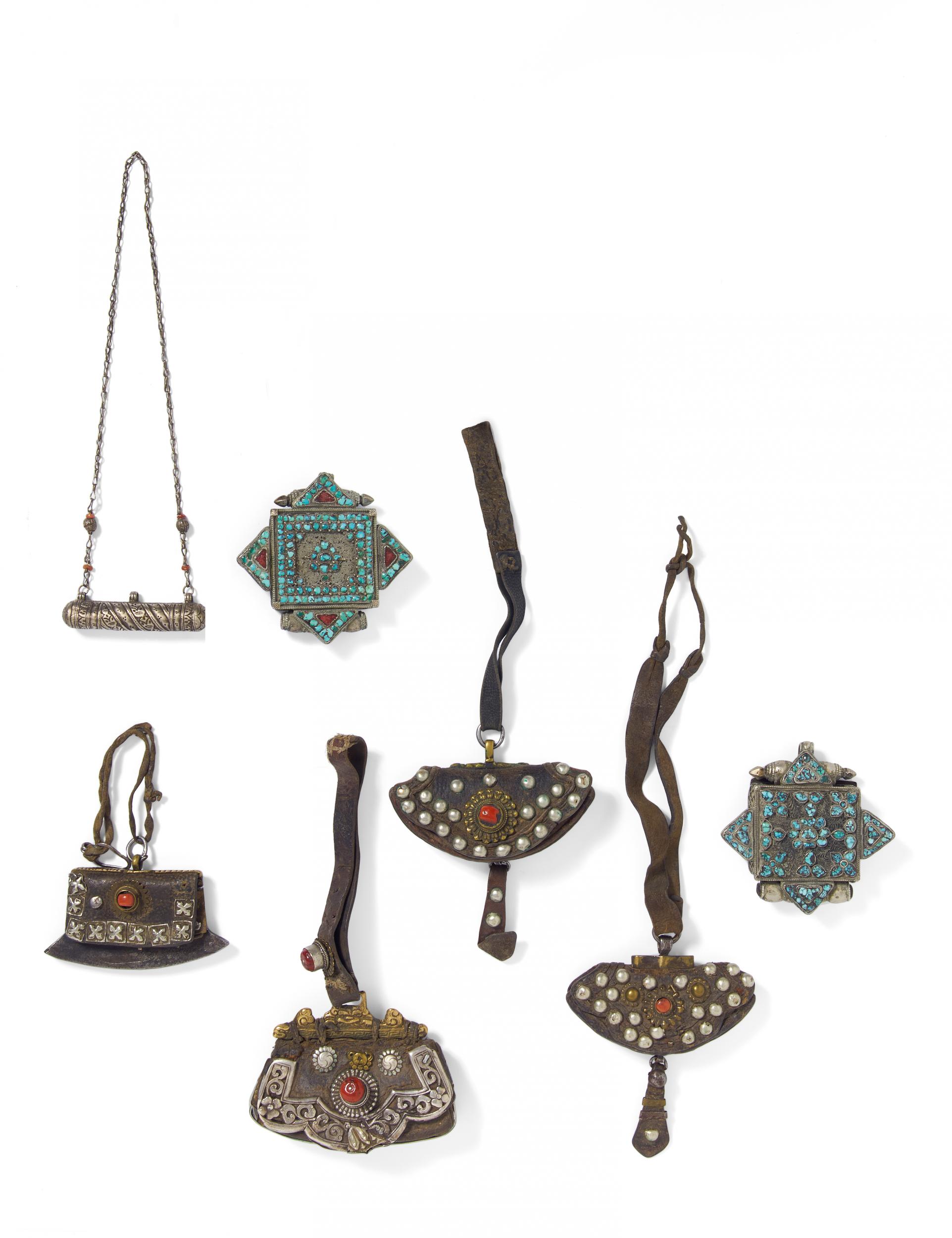 FOUR FIRE MAKING ETUIS AND THREE AMULET BOXES. Tibet. 19th/20th c. Metal, bronze, iron, leather,