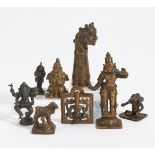 EIGHT SMALL FIGURES. India. 18th-20th c. Bronze with dark patina. a) Standing goddess. H.10.2cm.