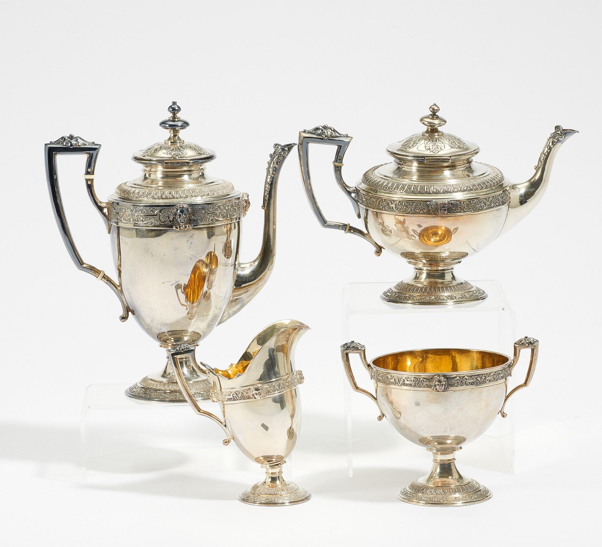 FOUR PIECE SILVER COFFEE & TEA SERVICE EMPIRE STYLE. Presumably Switzerland. 20th century. Silver,