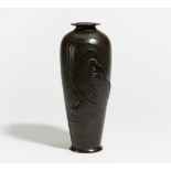 VASE WITH TWO LARGE CARPS. Japan. Meiji period (1868-1912). Bronze with dark patina. Relief. Eyes