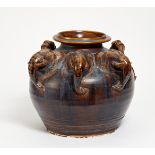 LARGE JAR WITH THREE ELEPHANT HEADS. Thailand. Stoneware with dark brown glaze. H.36cm. L.46cm.
