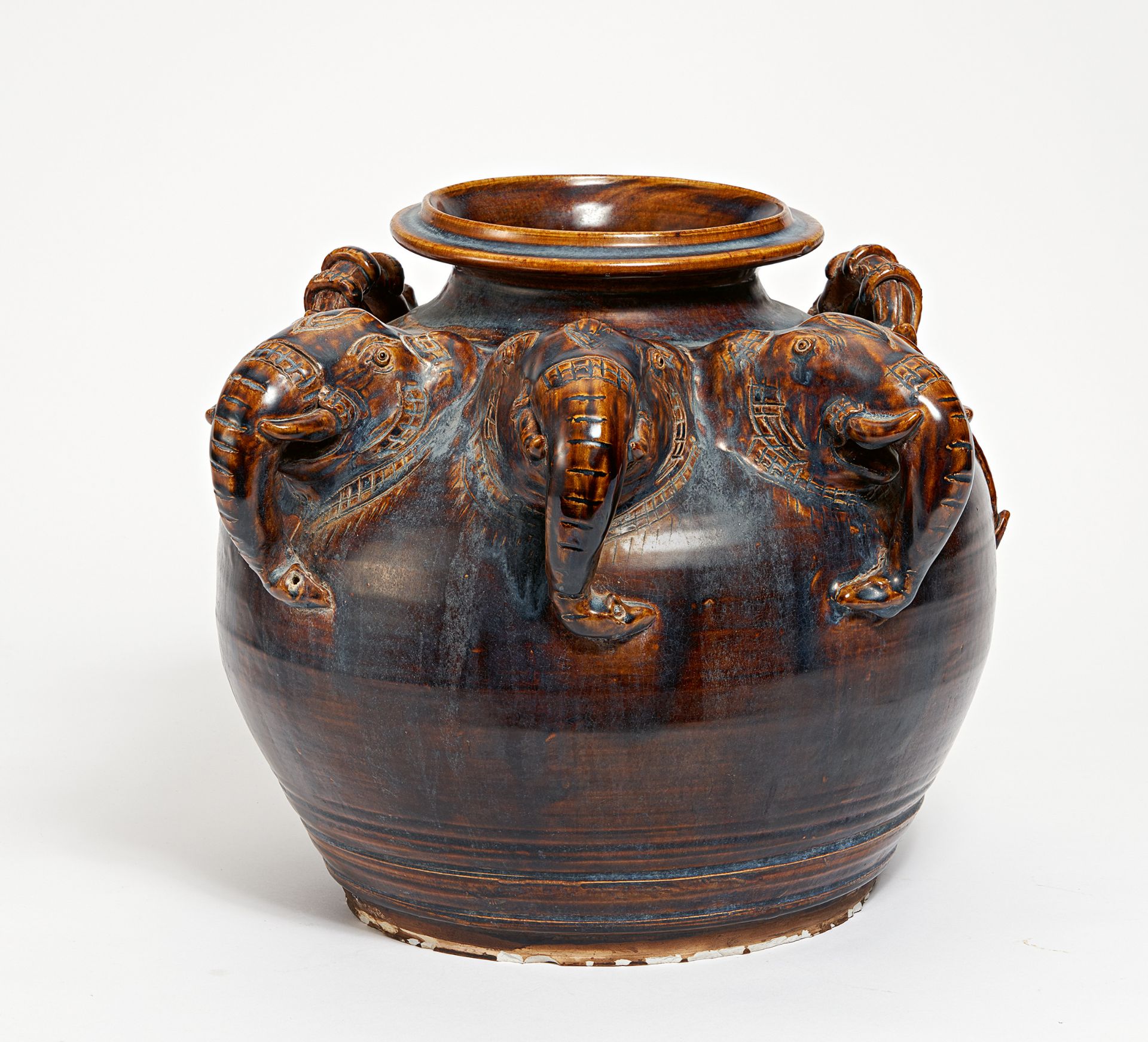 LARGE JAR WITH THREE ELEPHANT HEADS. Thailand. Stoneware with dark brown glaze. H.36cm. L.46cm.