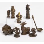 EIGHT FIGURES OF GODS AND A SMALL SPOON. India. 18th-20th c. Bronze with dark patina and residue