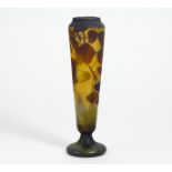 CLUB-SHAPED VASE WITH HAZEL BRANCHES. Daum Frères. Nancy. Acromatic glass with orange and green