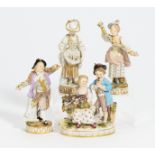 KINDERGRUPPE, 3 ROCOCOFIGUREN. Meissen. Porzellan, farbig und gold staffiert. H.16/16,5/17/17,5cm.