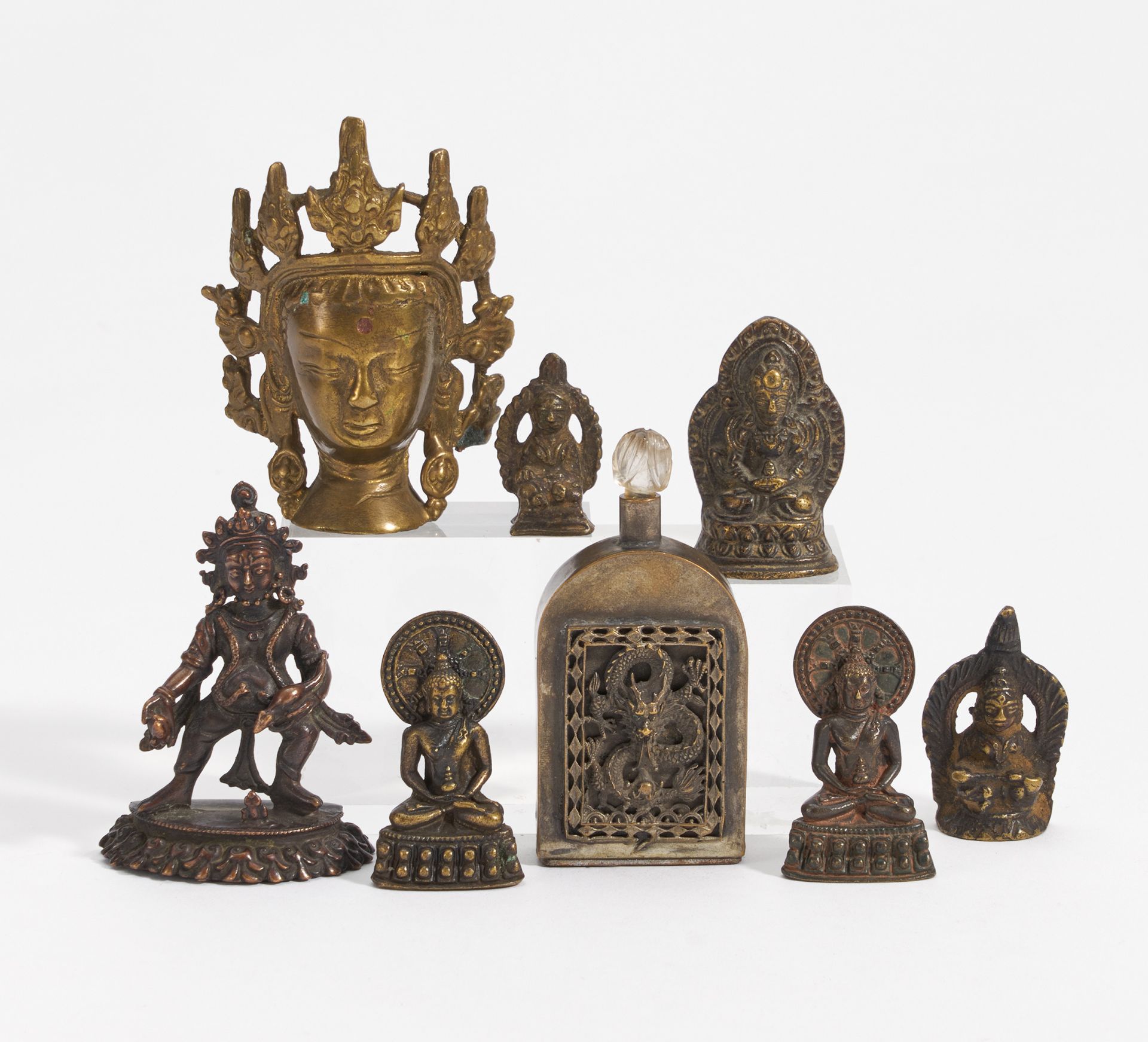 RARE STANDING JAMBHALA, FIVE SITTING BUDDHA AND A CROWNED BUDDHA HEAD. Tibet/Nepal. 18th-19th c.