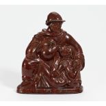 DER BARMHERZIGE SAMARITER. Royal Copenhagen. Modell J. Nielsen. Steinzeug, rot glasiert. H. 33cm.