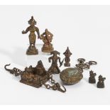 EIGHT FIGURES OF GODS AND OTHERS. India. 18th-20th c. Bronze with dark patina and residue of