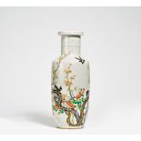 ROULEAU VASE WITH MAGPIES ON FLOWERING PLUMS. China. 19th c. Porcelain, finely painted with the