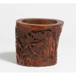 BRUSH POT WITH A SCHOLAR AT A CLIFF AND A POEM. China. 19th-20th c. Bamboo root, carved in sunken