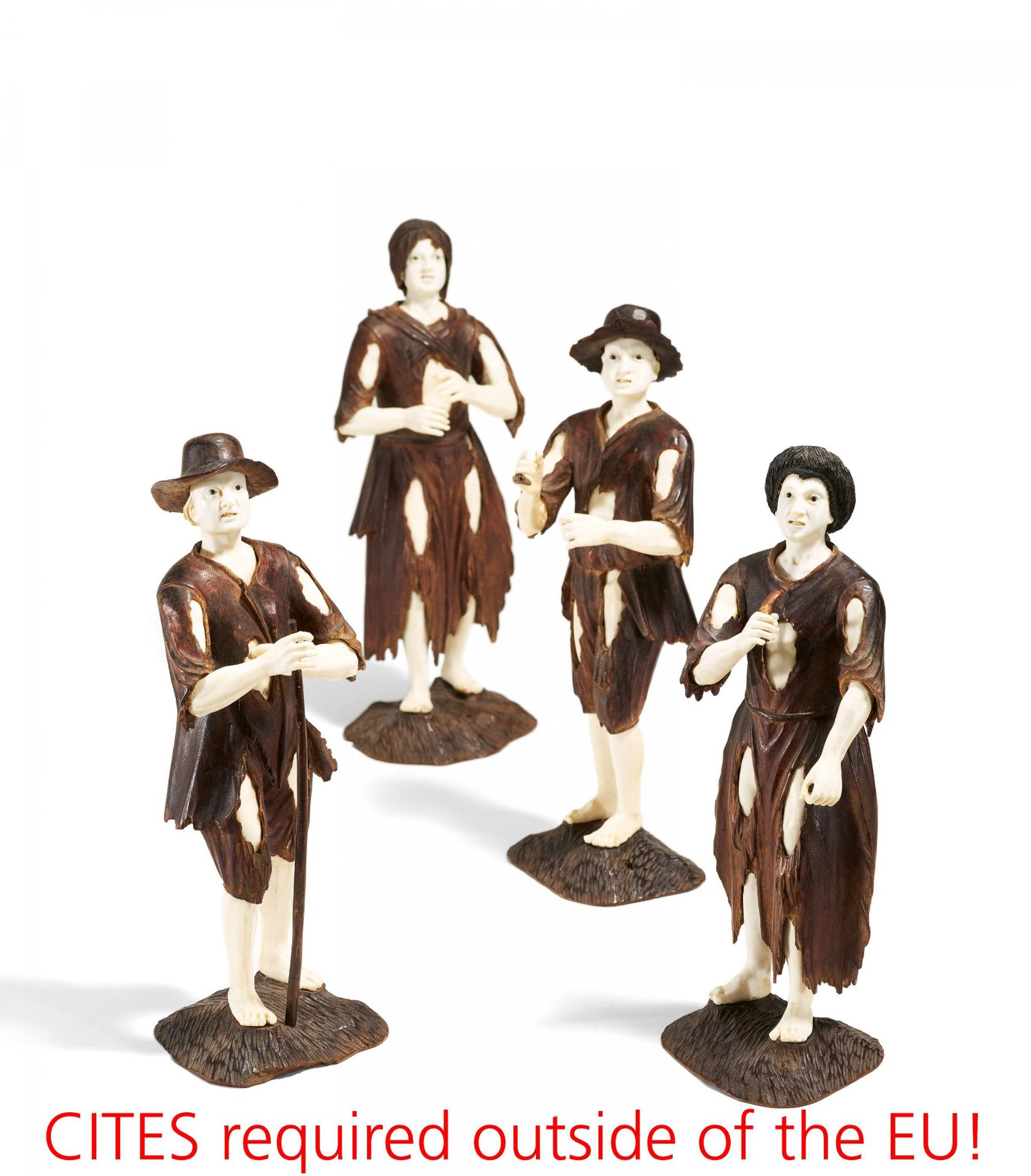Four limewood and ivory beggar figurines