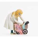 Mädchen mit Puppenwagen